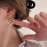 Full of zircon hollow circle letter F ear buckle personality fashion cold wind light luxury niche temperament earrings